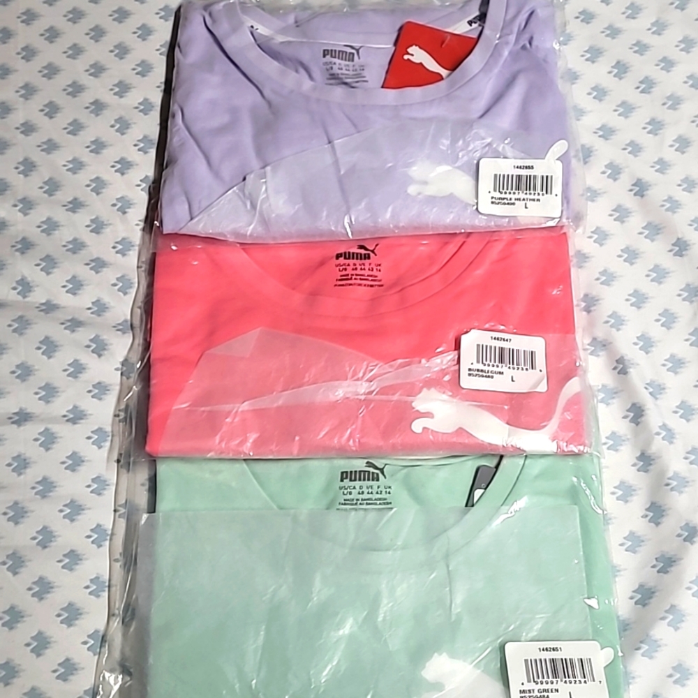 Brand new set of three PUMA crop tops